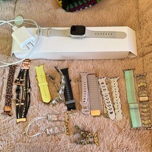 Apple Watch Series 7 starlight aluminum case with multiple bands